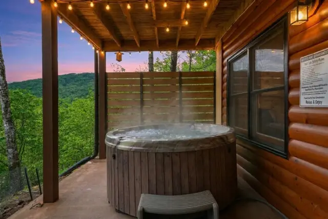 Soak in the hot tub as the mountains turn gold at dusk — warm water, cool air, and a view you won't find at any hotel.